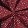 Miniatura de foto de Popelín estampado geométrico plumas patchwork granate