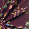 Miniatura de foto de Punto jersey color berenjena con flores