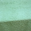 Miniatura de foto de Pelo rizado verde agua