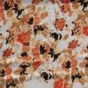 Miniatura de foto de Satén estampado manchas naranjas y negras
