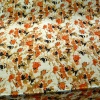 Miniatura de foto de Satén estampado manchas naranjas y negras