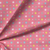 Miniatura de foto de Punto rosa con estrellas y puntos multicolor