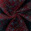 Miniatura de foto de Chenilla gris estampada con ornamentos rojos