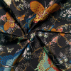 Miniatura de foto de Seda poliéster negra estampada mariposas multicolor