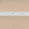 Miniatura de foto de Galón pasacintas bolillo con cinta blanco-celeste 15mm