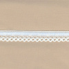 Miniatura de foto de Puntilla pasacintas con cinta blanco y celeste 17mm