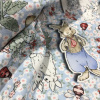 Miniatura de foto de Viyela estampado conejos y pájaros azul