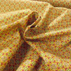 Miniatura de foto de Popelín patchwork estampado digital geométrico multicolor, fondo ocre
