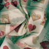 Miniatura de foto de Mantel loneta estampada corazones rojos y beige