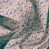 Miniatura de foto de Loneta estampado manchas rojo, rosa, azul, negro, turquesa