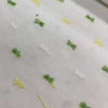Miniatura de foto de Plumeti fondo blanco topitos verde y amarillo