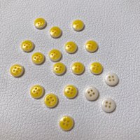 Miniatura de foto de Botón amarillo 9mm.
