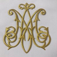 Miniatura de foto de Aplicación termoadhesiva letra M Virgen María metalizada oro. 