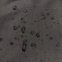 Miniatura de foto de Tela negra con tratamiento hidrofugo (35 lavados)