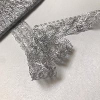 Miniatura de foto de Puntilla de bolillo metalizada plata
