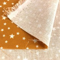 Miniatura de foto de Popelín oro estrellas blanco