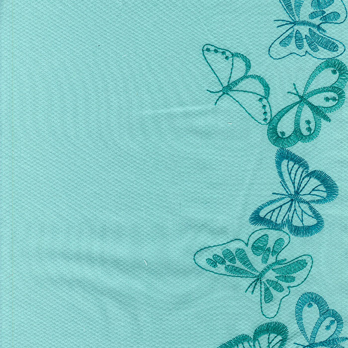 Foto de Volante piqué agua, bordado mariposas