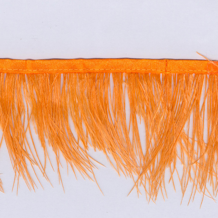Foto de Fleco de plumas de avestruz naranja 7cm