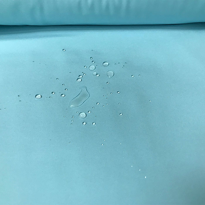 Foto de Impermeable neopreno liso doble cara agua