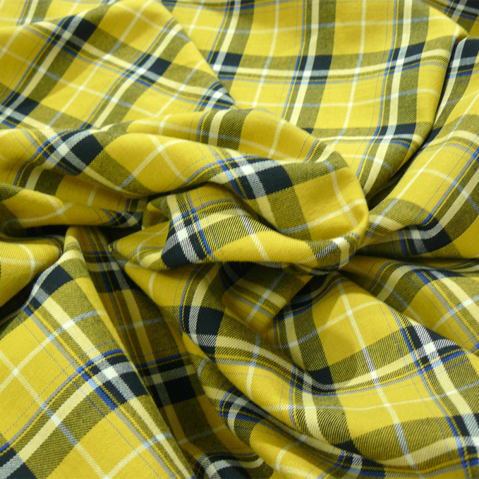 Foto de Cuadro escocés amarillo mostaza, negro, blanco, azul