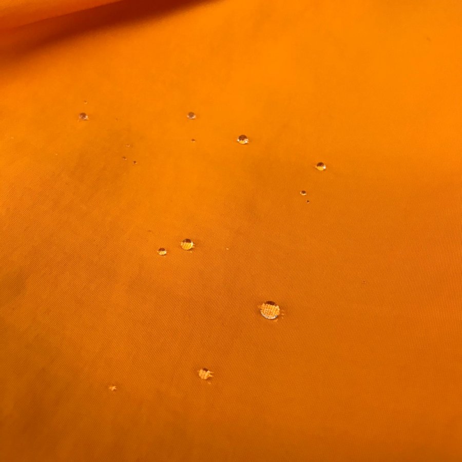 Foto de Microfibra hidrofuga antibacterias mascarillas naranja 