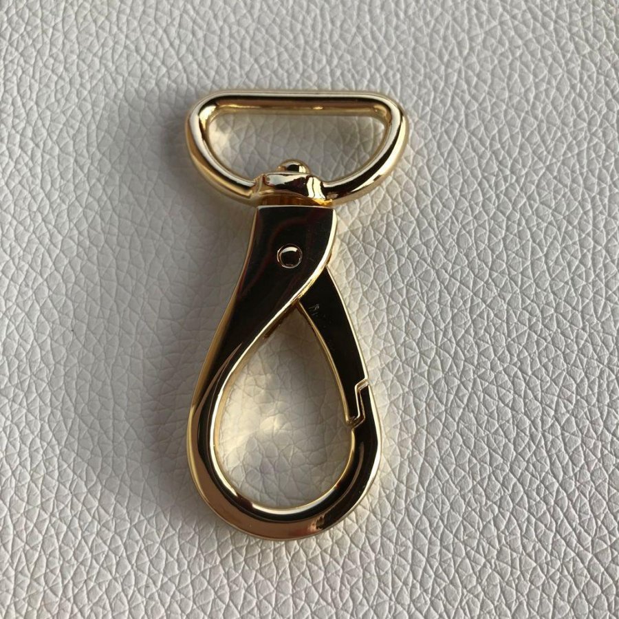 Mosquetón con anilla metálico dorado 25mm